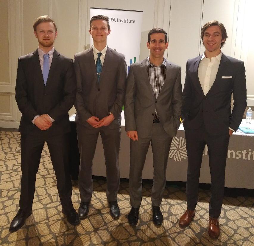 This University of Calgary team were regional finalists in the Chartered Financial Analyst Institute Research Challenge; from left: Matthew Nakaska, Daniel Johansson, faculty adviser Ari Pandes, and Grant Maheu.
