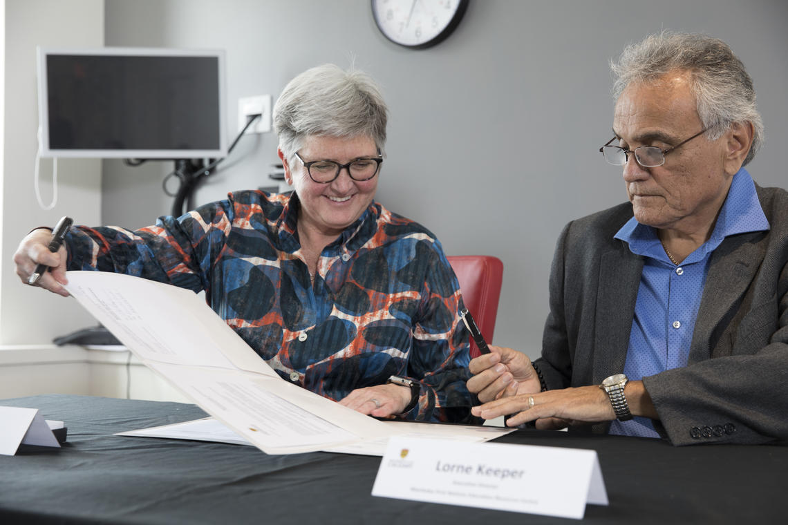 University of Calgary Provost Dru Marshall with Manitoba First Nations Education Resource Centre Executive Director Lorne Keeper during the signing ceremony at the Werklund School of Education March 28.