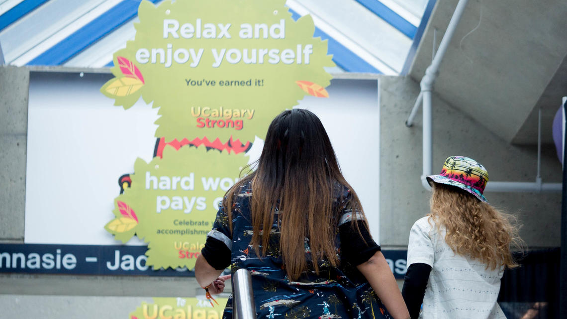 A student enters the UCalgaryStrong Festival in 2017.