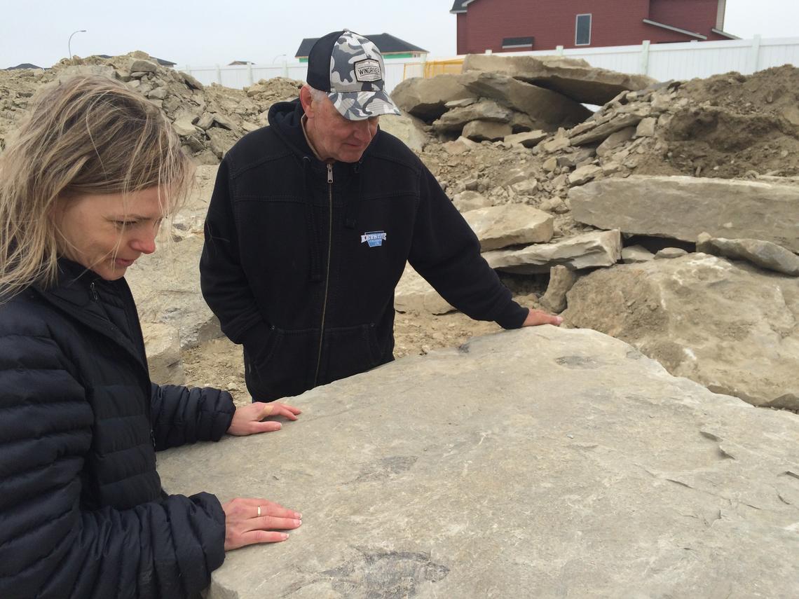 University of Calgary paleontologist Darla Zelenitsky and Edgar Nernberg at the site where the fish fossils were discovered.