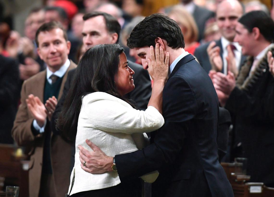 Justin Trudeau embraces woman