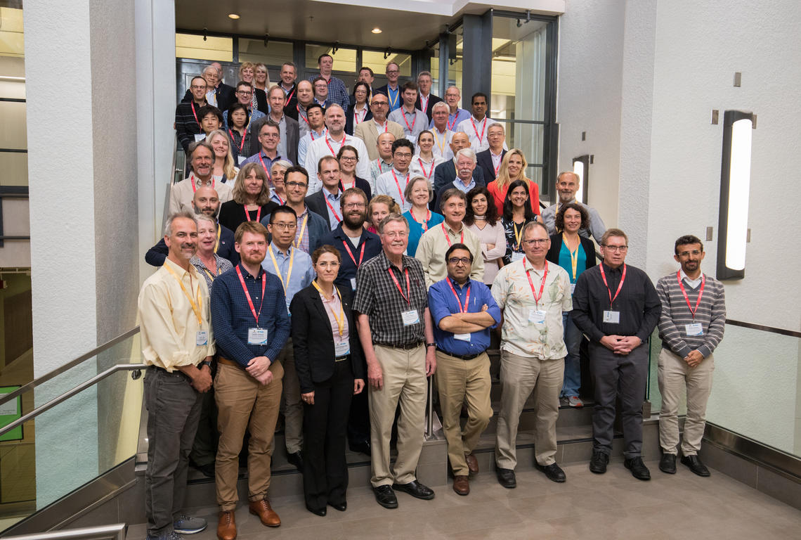 Workshop participants gather for a group photo