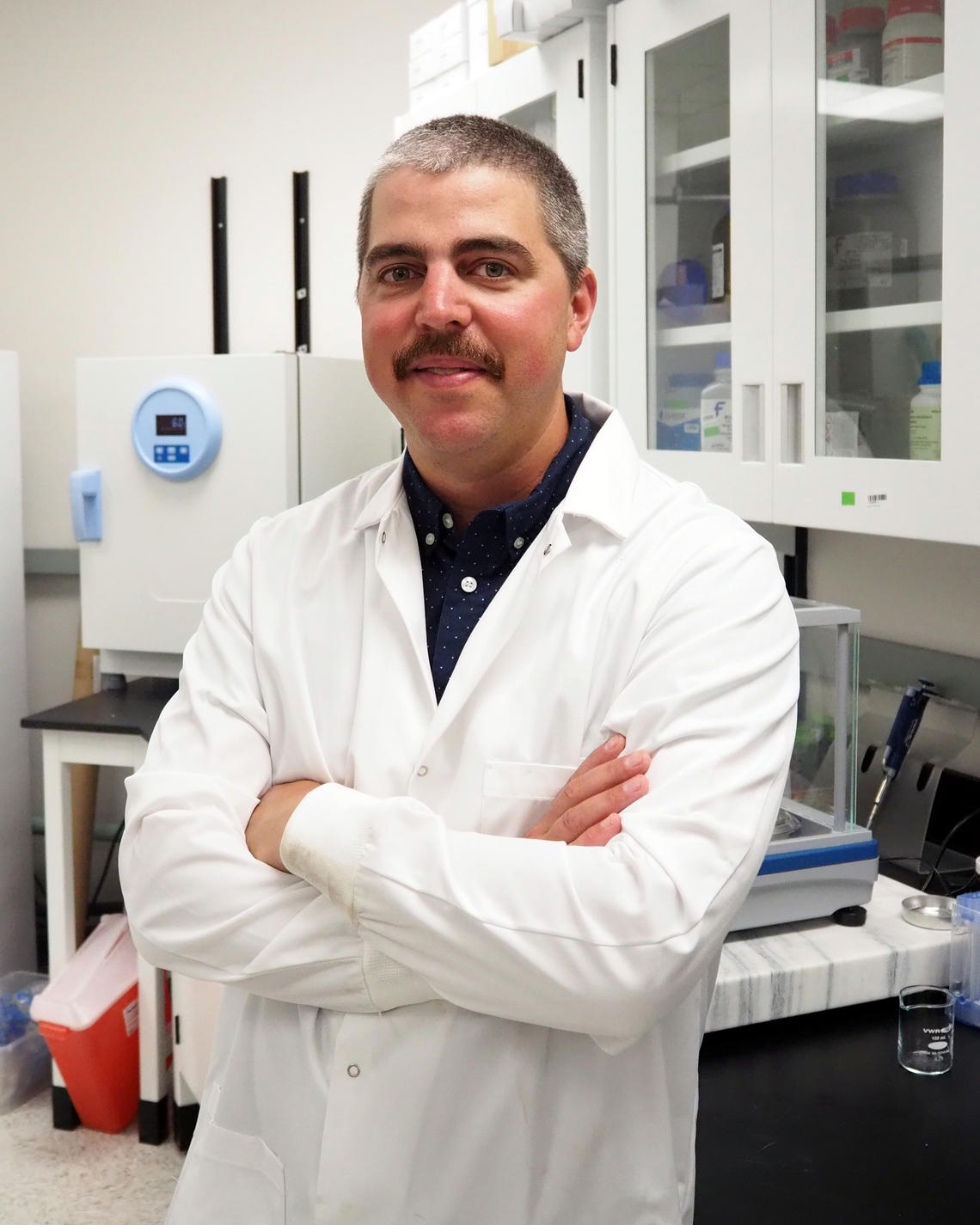 Dr. Ben Tutolo in the lab