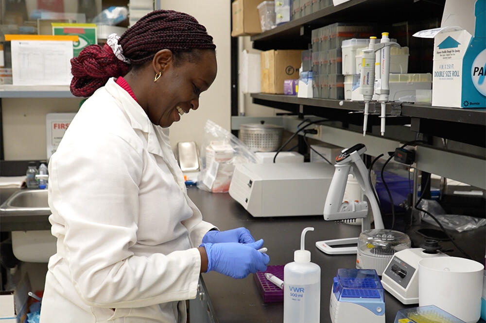 Dr. Ibukun Akinrinade working in the lab.