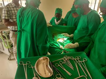 Clinical staff participate in cesarean-section simulation training in the new Mbarika operating theatre