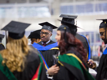 Students celebrate graduation at the 2019 fall convocation ceremony.