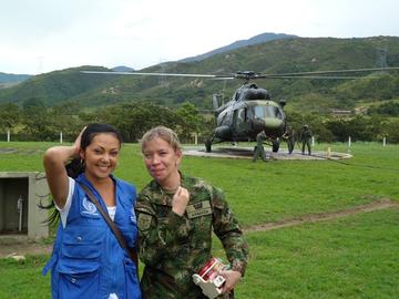 Franco and soldier in front of a helicoper
