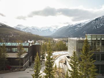 A view of the Banff Centre with mountains in the background