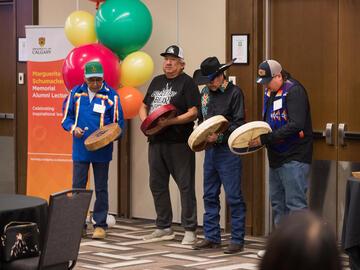 Drummers from Siksika perform at the opening
