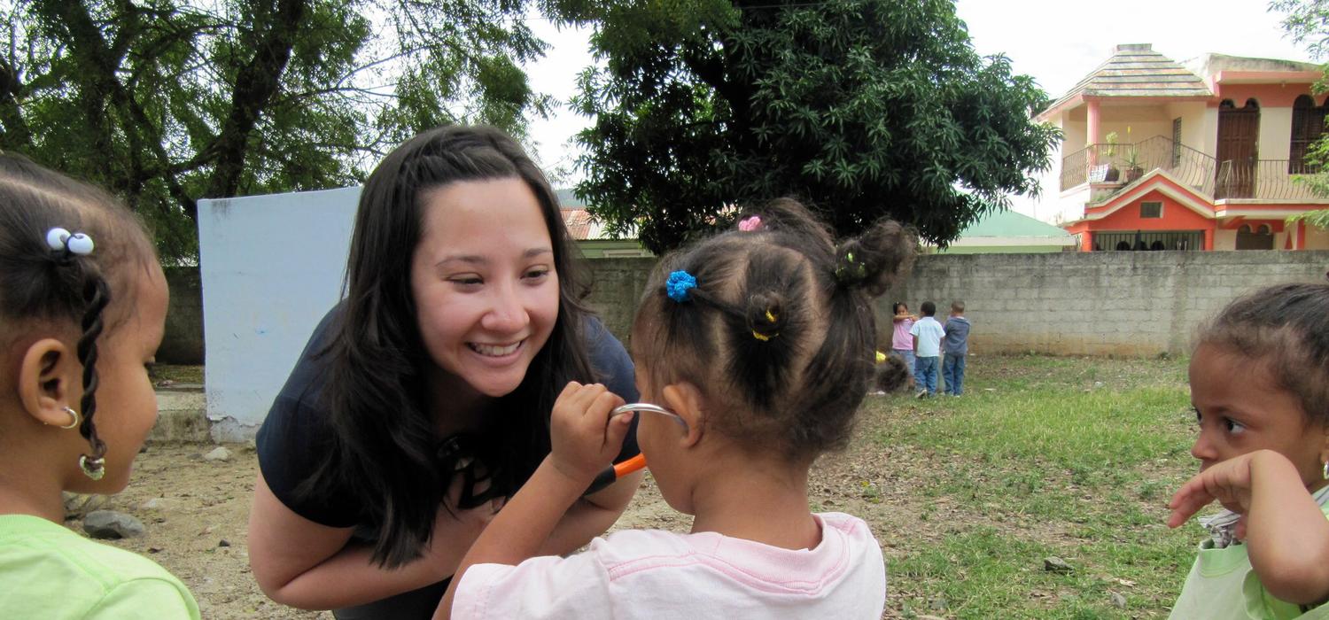 Kate Wong in Dominican Republic in 2011 with preschool students.