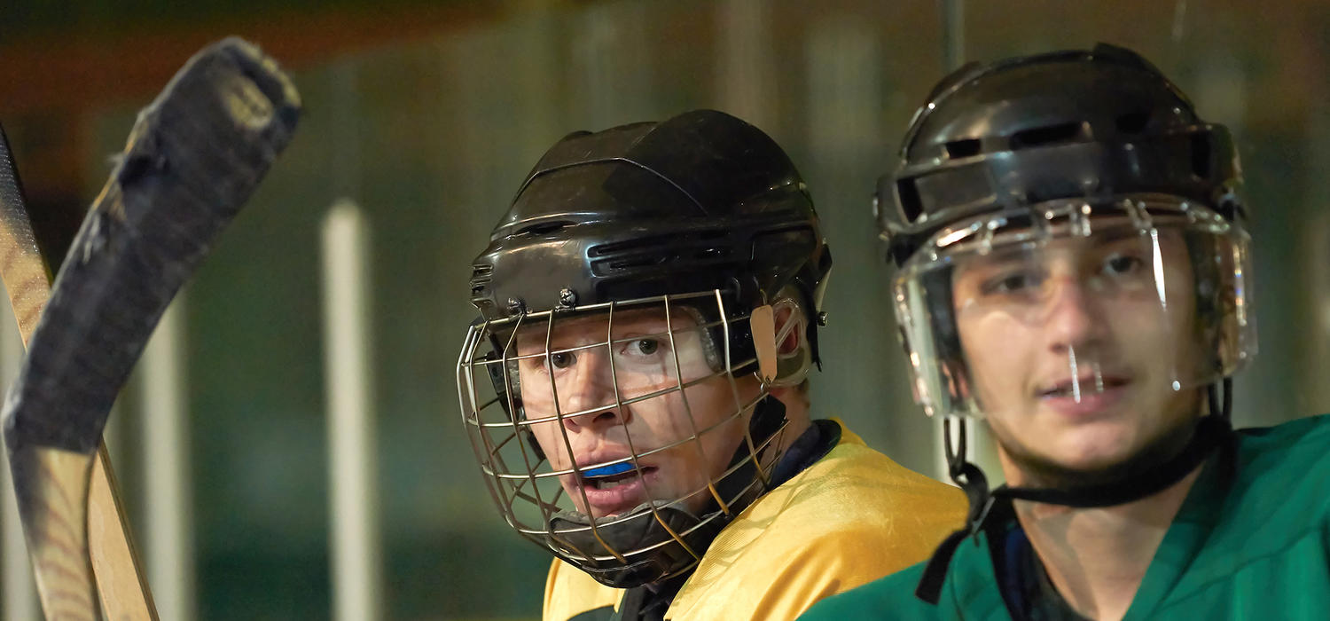 Hockey players wearing mouthguards
