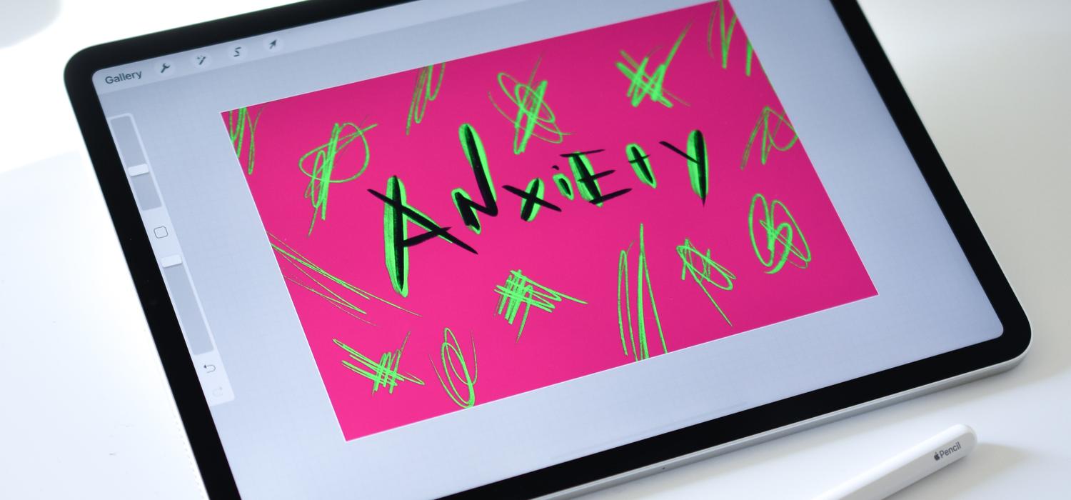 Tablet with "Anxiety" written on the screen in a colour design