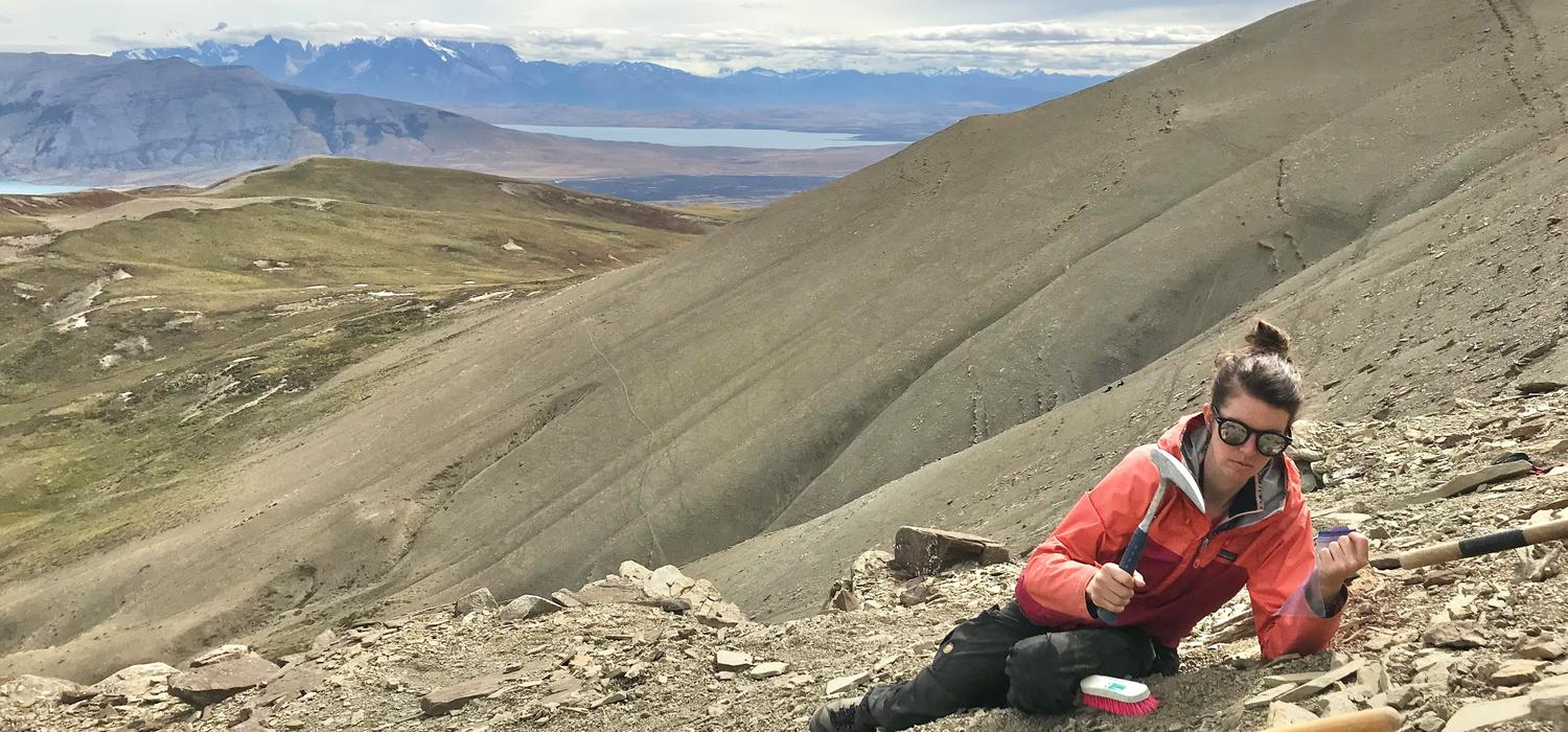 Sophie Hage working at the field site in Chile, taking sedimentary rock samples.