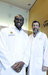 Henry Ogbomo, left, and Chris Mody have discovered that the body's army of natural killer cells have different ways to attack predators, like cancerous tumour cells and the microbes that cause infections. Photos by Pauline Zulueta, Cumming School of Medicine
