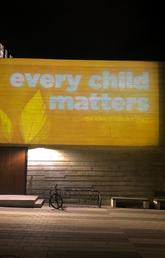 The Every Child Matters night light tribute outside the Taylor Family Digital Library at UCalgary