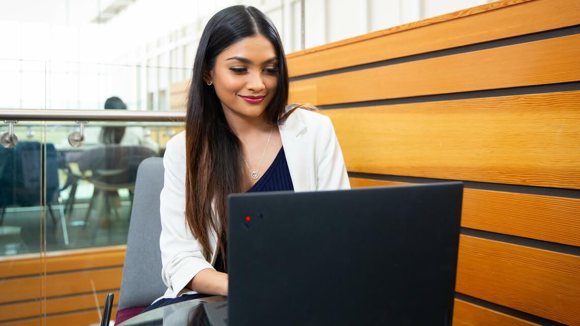 Image of a student using a laptop