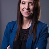 A photo of Dr. Roach smiling